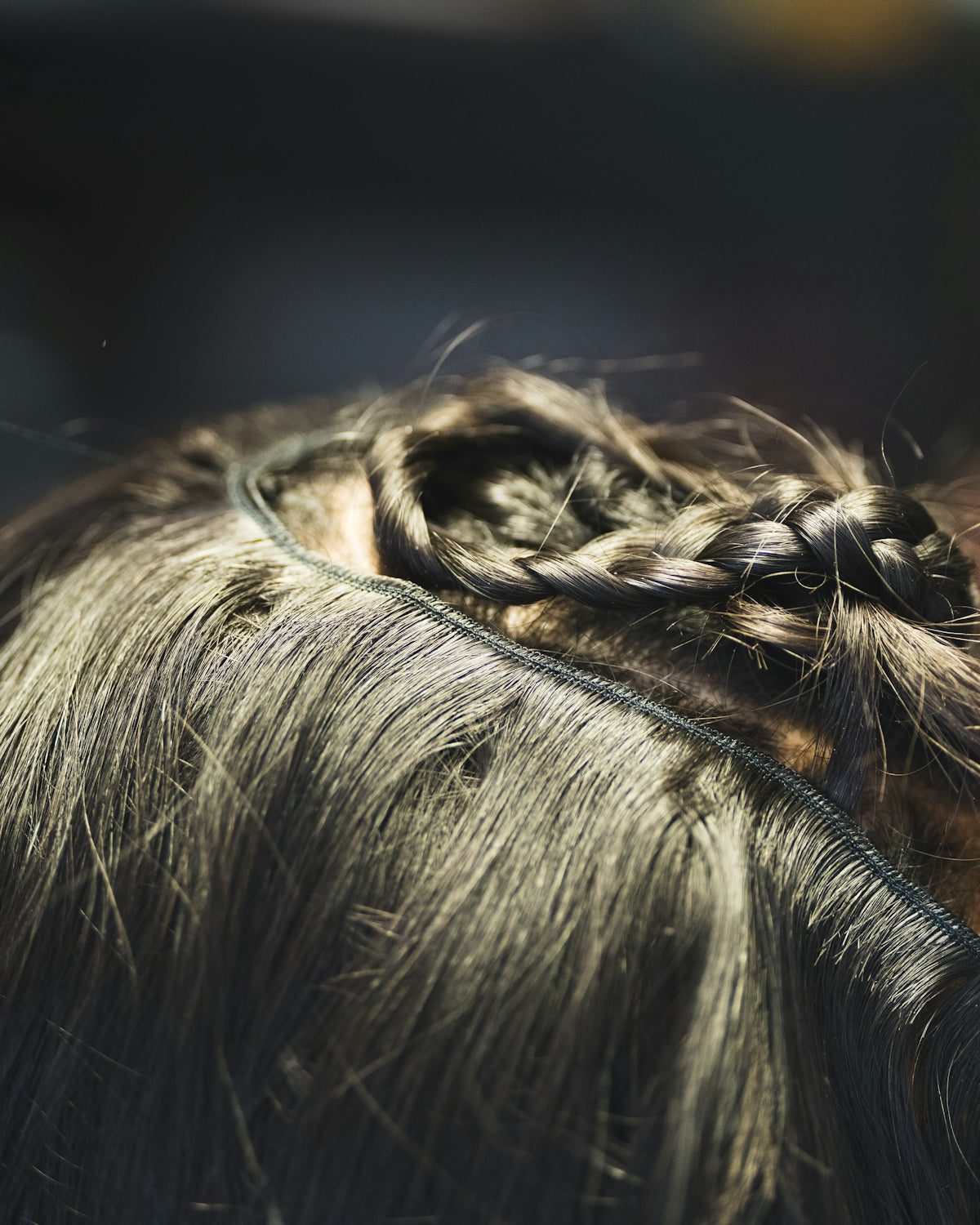 Close-up of a braided hairstyle on dark hair